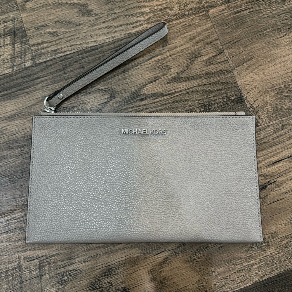 Michael Kors Jet Set Travel Large Perforated Wristlet in Gray Silver
